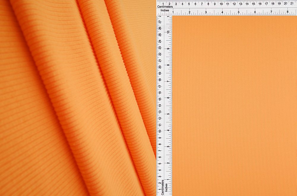 KNT4114 / ORANGE LT / 87%POLY 13%SPAN 2x1 YUMMY RIB SOLID