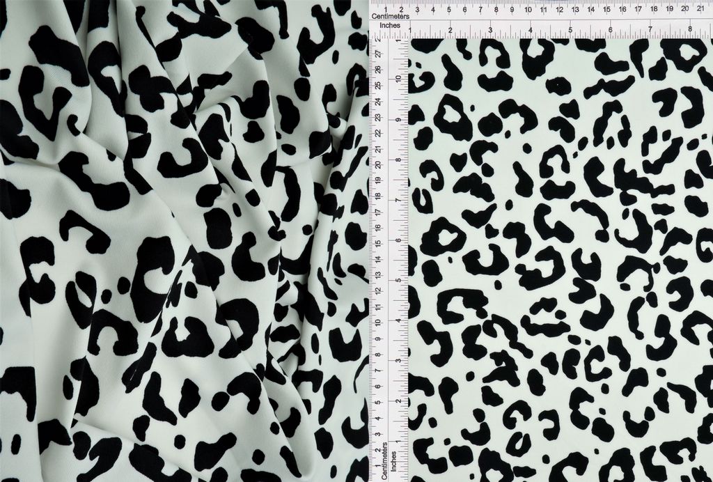 KNT1389-Q10720 / IVORY/BLACK / 96%POLY 4%SPAN DTY ANIMAL PRINT