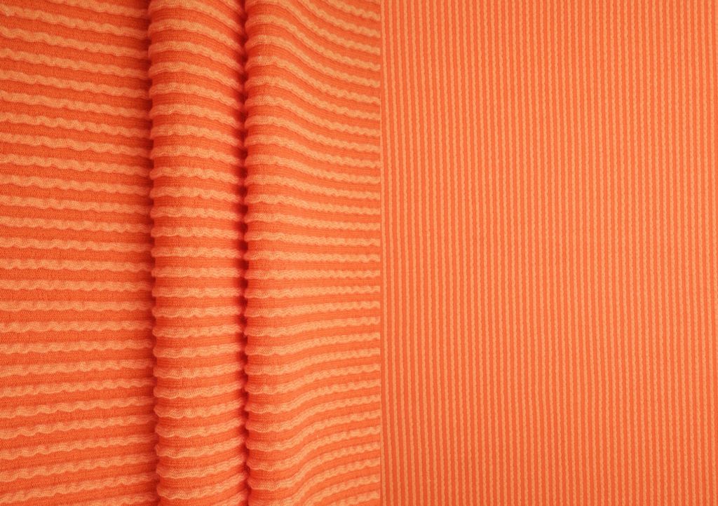 KNT4463 / ORANGE / 80%POLY 15%RAY 5%SPAN KNIT JACQUARD RIB