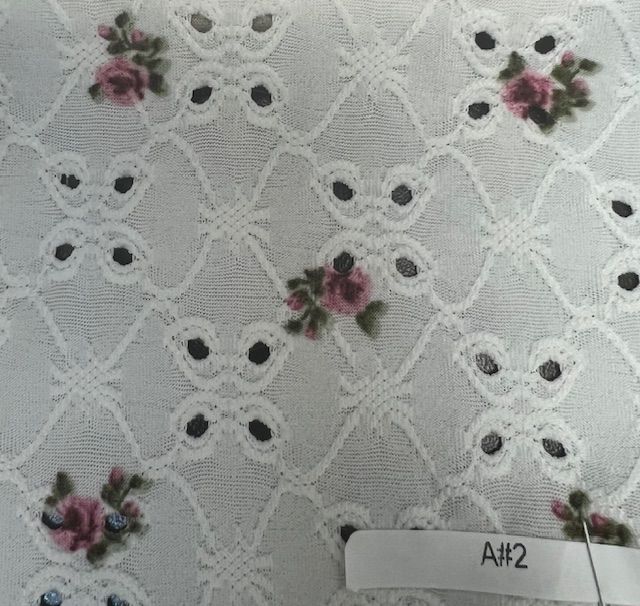 KNT4187-Q00205 / IVORY / 97%POLY 3%SPAN DTY KNIT JACQUARD DITSY EYELET PRINT