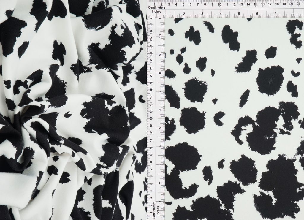 KNT4520-MS11098 / IVORY/BLACK / 96%POLY 4%SPAN DTY BRUSHED COW ANIMAL PRINT